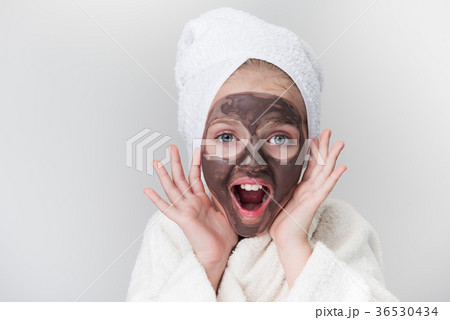 Cute little child is likes skincare treatment 36530434