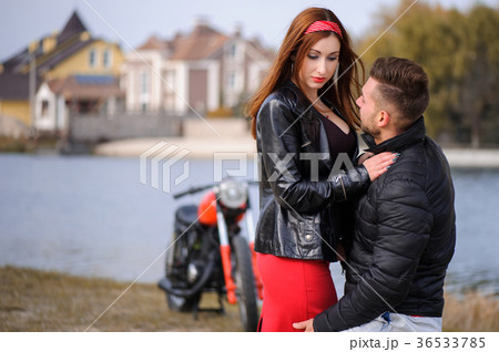 stylish and trendy couple in love on a motorcycle 36533785