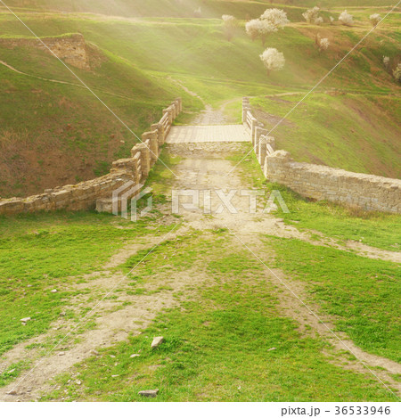 Antique old roman stones bridge. 36533946