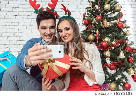 Couple making selfie photos with phone on 36535188