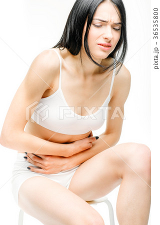 Abdominal pain, female person with stomach problem Abdominal pain, female person with stomach problem 36535800