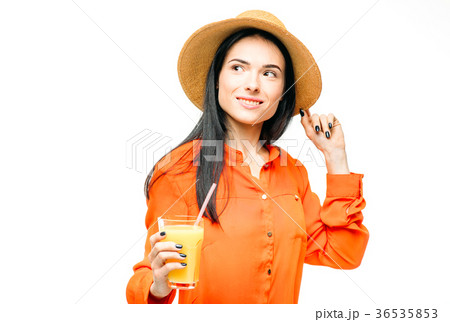 Woman drinks fresh juice fruit, white background Woman drinks fresh juice fruit, white background 36535853
