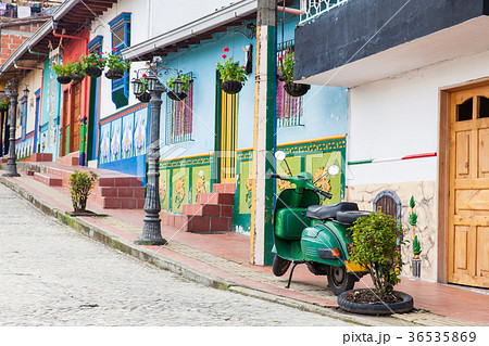 Green motorcycle at the colorful town of Guatape Green motorcycle at the colorful town of Guatape 36535869
