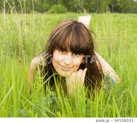 woman on grass woman on grass 36536031