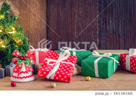 gifts and toys on wooden boards with Christmas 36536566