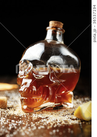 a bottle in the form of a skull with a cocktail a bottle in the form of a skull with a cocktail 36537194