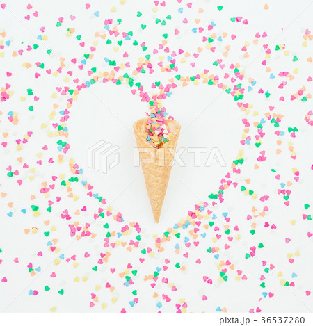 Heart made of bright candy confetti and waffle Heart made of bright candy confetti and waffle 36537280