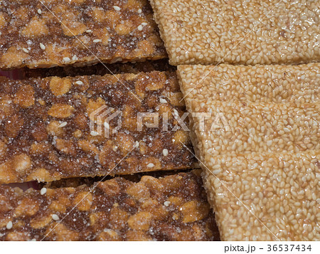 Sweet snack bar with peanuts and sesame seeds Sweet snack bar with peanuts and sesame seeds 36537434