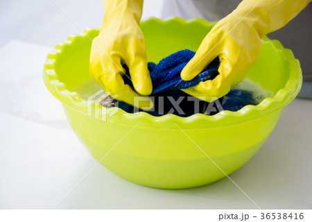 Woman doing cleaning at home Woman doing cleaning at home 36538416