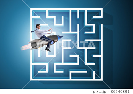 Uncertainty concept with businessman lost in maze 36540391