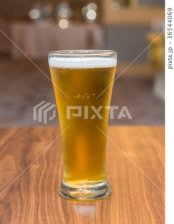 Glass of beer in pub and restaurant Glass of beer in pub and restaurant 36544069