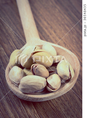 Vintage photo, Pistachio nuts with spoon 36548435