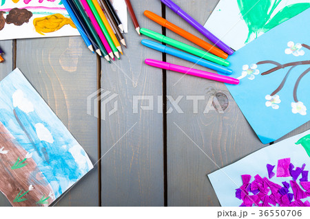 Child pictures. Kid drawings. Flat lay. Copy space 36550706