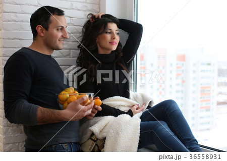 A young married couple in a new apartment A young married couple in a new apartment 36558931