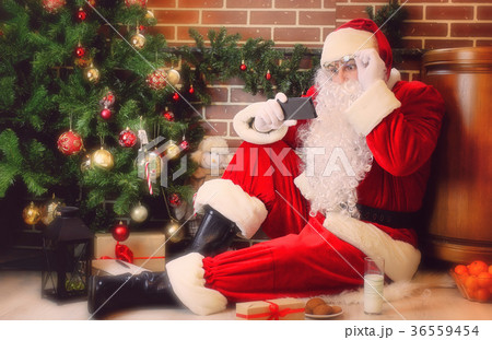 Santa Claus with Christmas tree Santa Claus with Christmas tree 36559454
