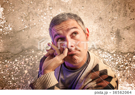 man with a finger in his nose, ridiculous expression man with a finger in his nose, ridiculous expression 36562064