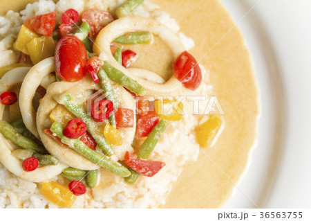 Squid rings in chilli curry sauce served with rice 36563755