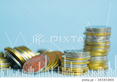 coin stacks with financial graph 36565860