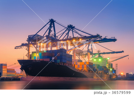 Shipping yard and loading terminal at sunrise Shipping yard and loading terminal at sunrise 36579599
