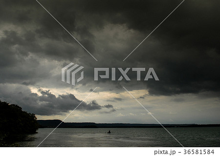 Storm and Rain over lake, France 36581584