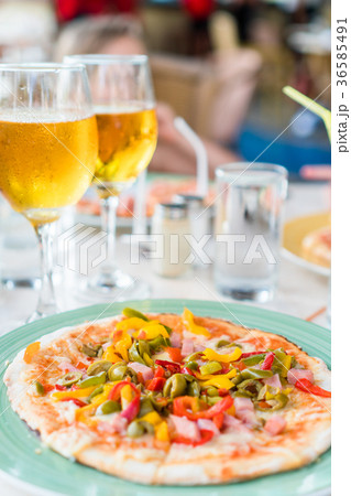 Pizza with mozzarella cheese, olive, fresh tomato Pizza with mozzarella cheese, olive, fresh tomato 36585491