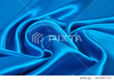 Natural blue satin fabric texture background Natural blue satin fabric texture background 36586715