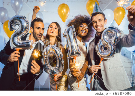 Party people women and men celebrating new years 36587090