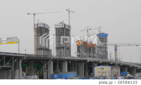 Many of cranes. Tower cranes against blue sky 36588135
