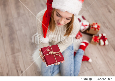 Teenage girl with Christmas presents 36592167