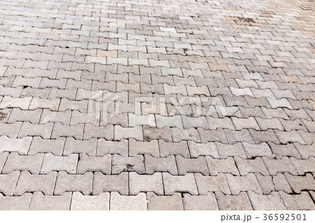 Paving stone on the road as a background Paving stone on the road as a background 36592501