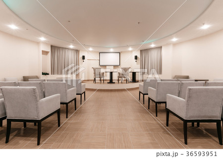 Row of chairs in boardroom. seats in an empty Row of chairs in boardroom. seats in an empty 36593951
