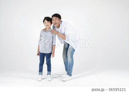 Young father and son playing together portrait. Studio shot. 014 36595221