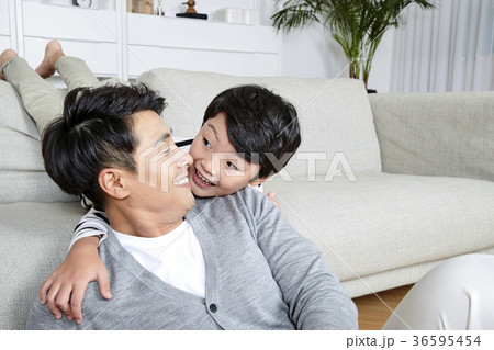 Young father and son take a rest in the living room 140 Young father and son take a rest in the living room 140 36595454