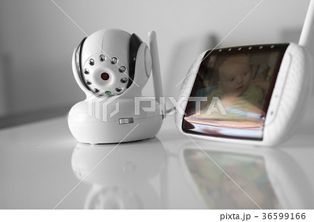 The closeup baby monitor for security of the baby 36599166