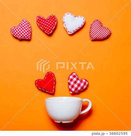 White cup and heart shapes White cup and heart shapes 36602595
