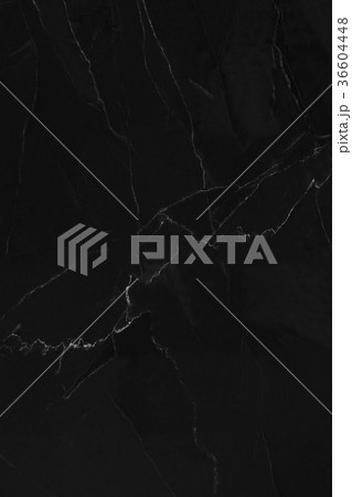 Black marble patterned texture background. Black marble patterned texture background. 36604448