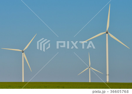 Windmills for electric power production blue sky 36605768