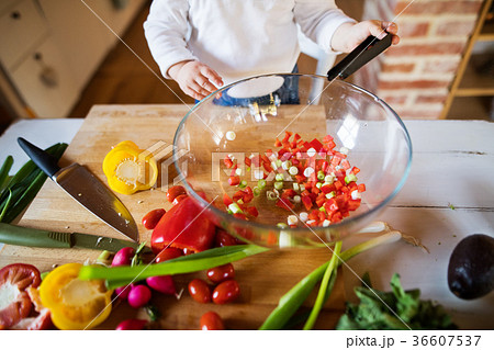 Toddler boy in the kitchen. 36607537