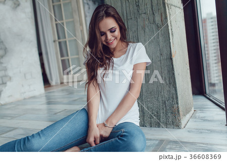 Sexy woman in a white t-shirt. Mock up. 36608369