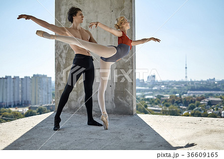 Ballet dancers posing at unfinished building 36609165