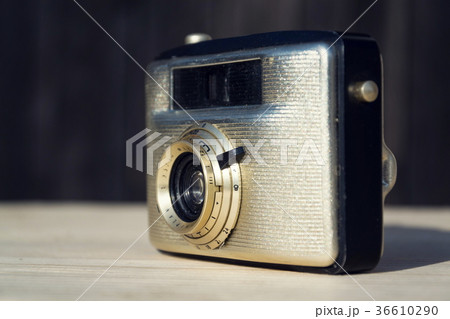 Old vintage golden Penti I camera on wood 36610290