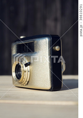 Old vintage golden Penti I camera on wood 36610291