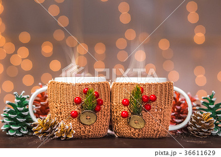 Two white steaming cups Two white steaming cups 36611629