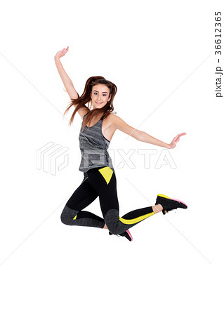 fit woman in sportswear jumping fit woman in sportswear jumping 36612365