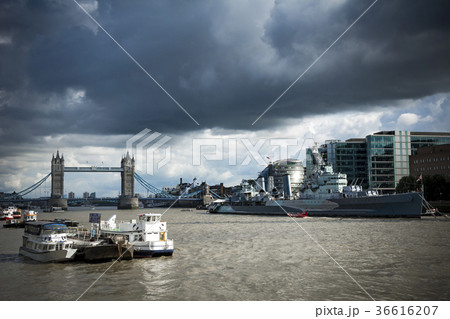 HMS Belfast and Tower Bridge under moody skies 36616207