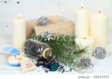 Winter spa concept with candles Winter spa concept with candles 36616555