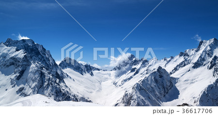 Panoramic view of snow covered mountain peaks 36617706