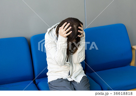 A Japanese woman with a bad headache 36618818