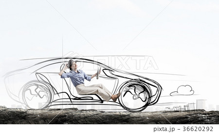 Woman in drawn car Woman in drawn car 36620292