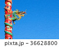 Chinese Dragon on Red Pillar on Blue Background 36628800